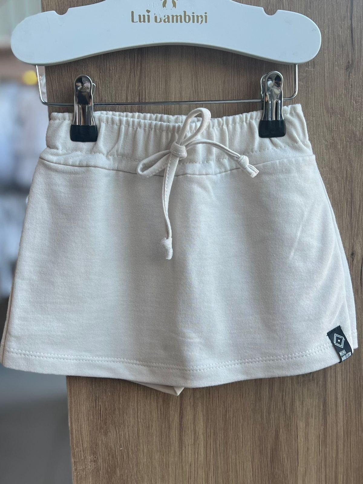 SHORT SAIA MINIMALISTA CORDÃO ELÁSTICO CÓS MENINA FAKINI - BEGE