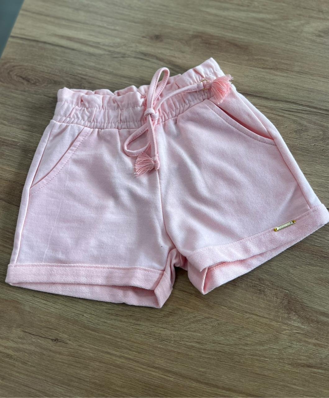 SHORT MOLETOM CORDÃO ELÁSTICO CÓS BOLSO FACA E BARRA DOBRADA MENINA PULLA BULLA - ROSA CLARO