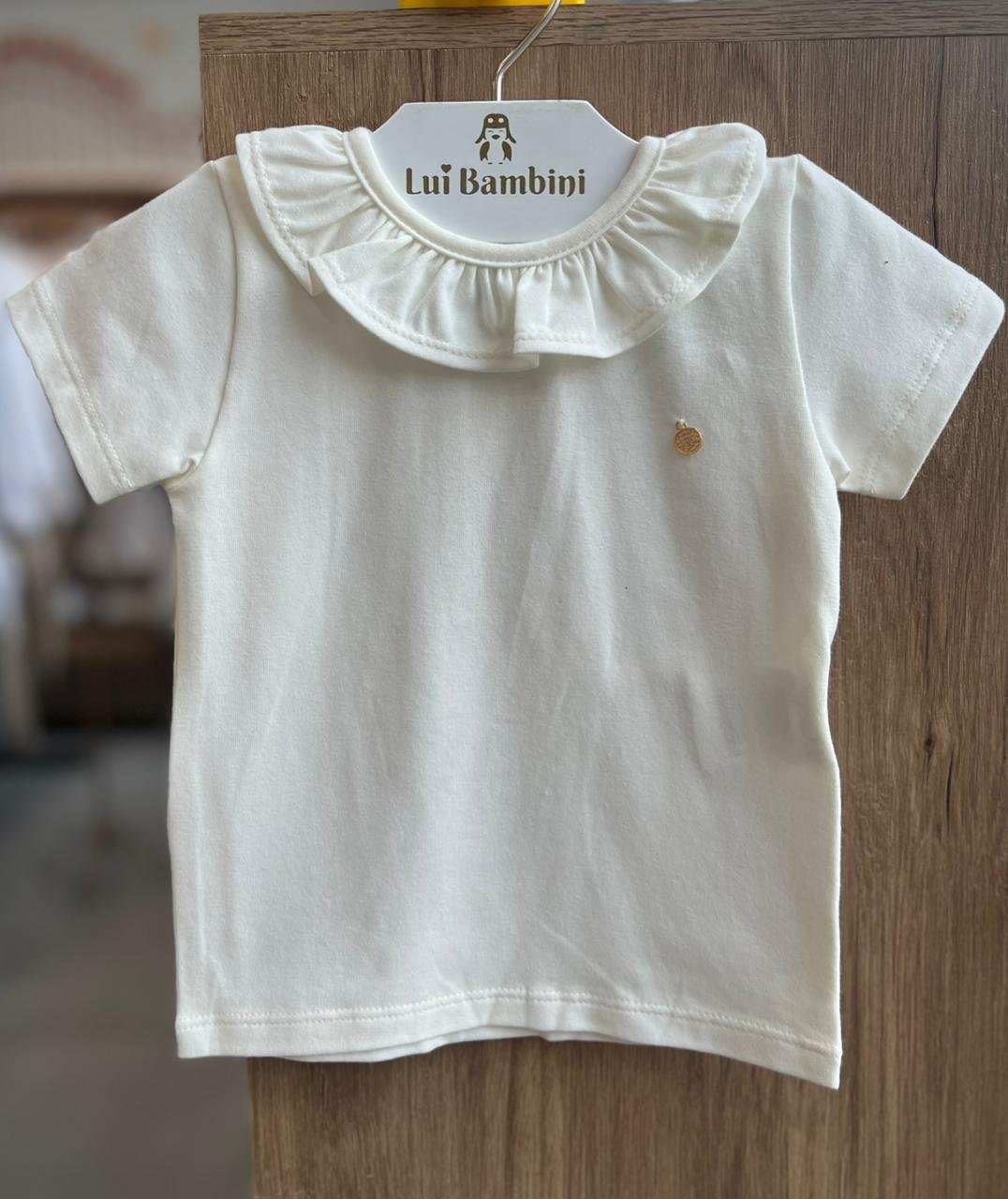 BLUSA MANGA CURTA GOLA BABADO BÁSICA LISA COM PINGENTE MENINA GROW UP - CREME
