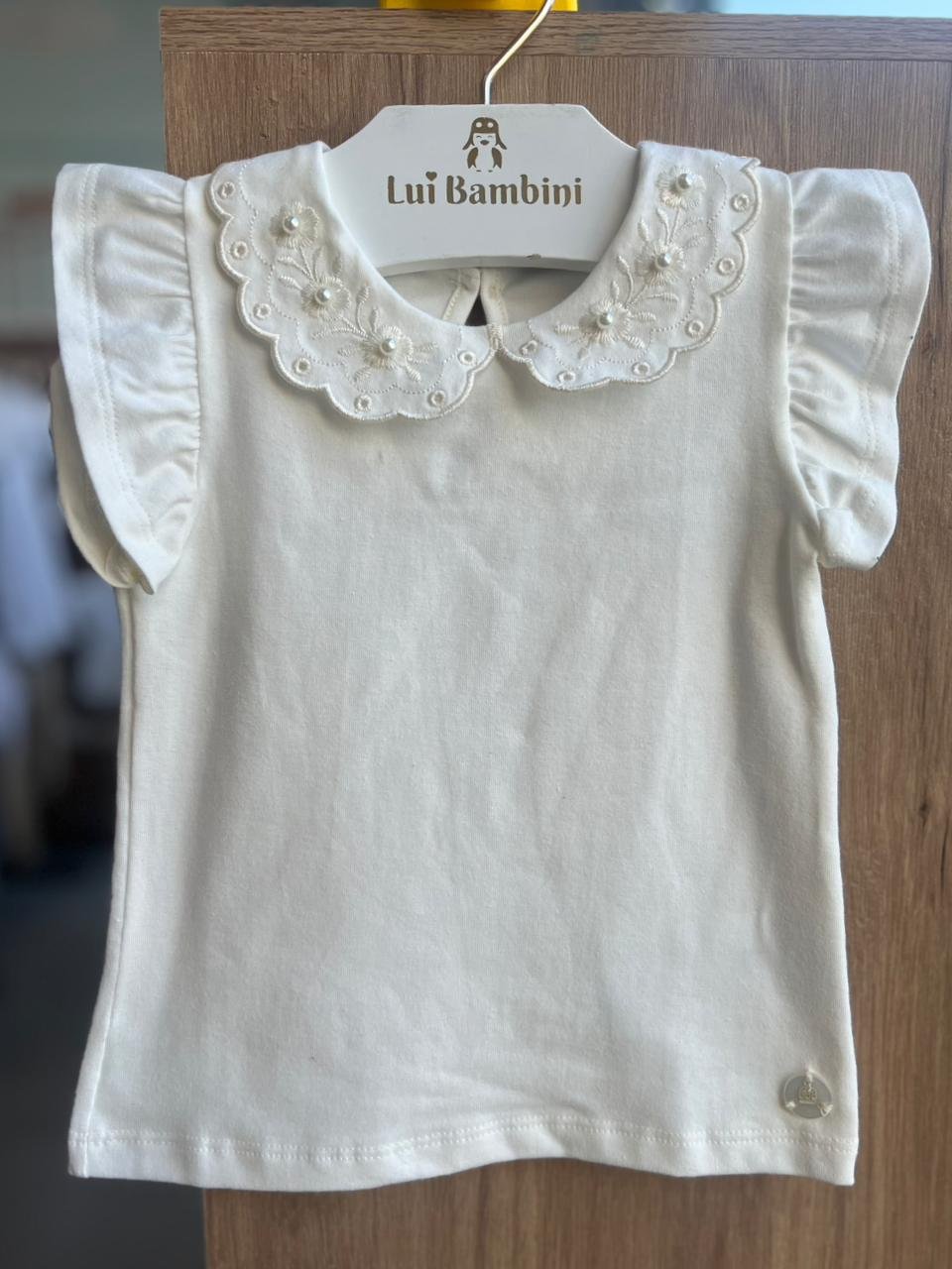 BLUSA MANGA CURTA GOLA FLORAL BORDADA COM PÉROLAS E BABADO MENINA MILON - OFF