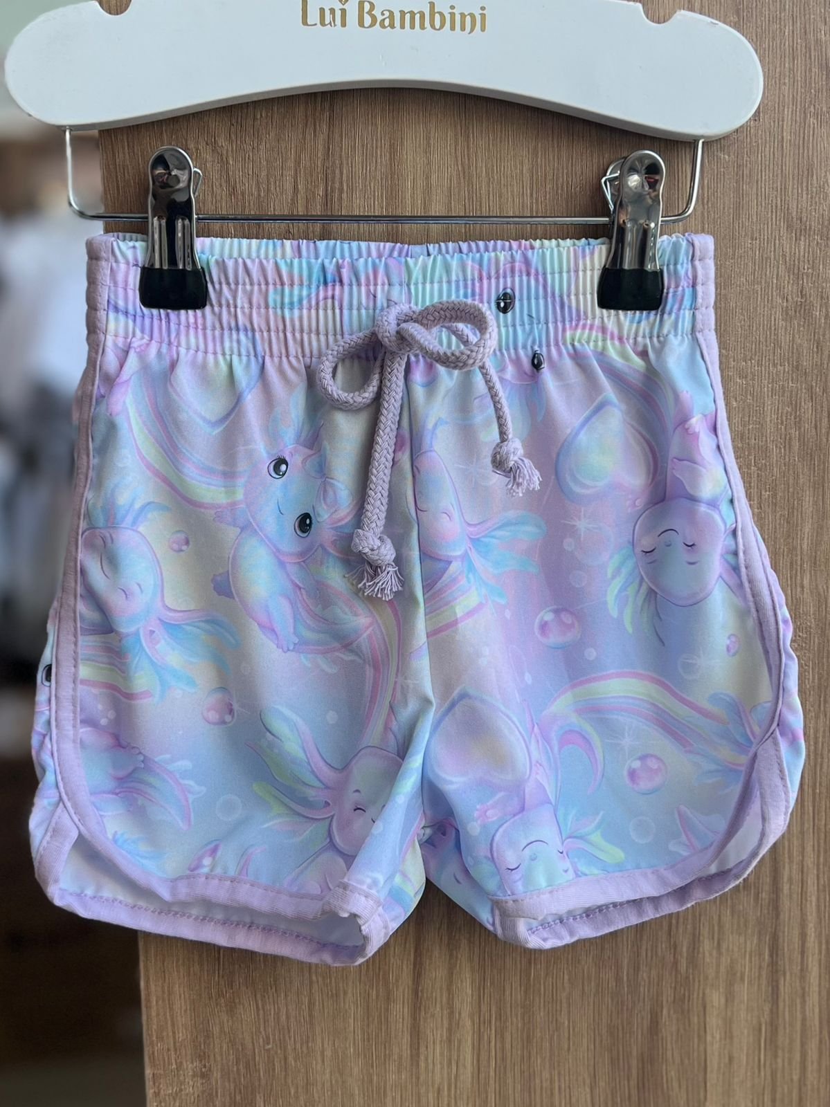 SHORT CORDÃO ELÁSTICO CÓS BICHINHOS AXOLOTE MENINA CINTI - LILÁS