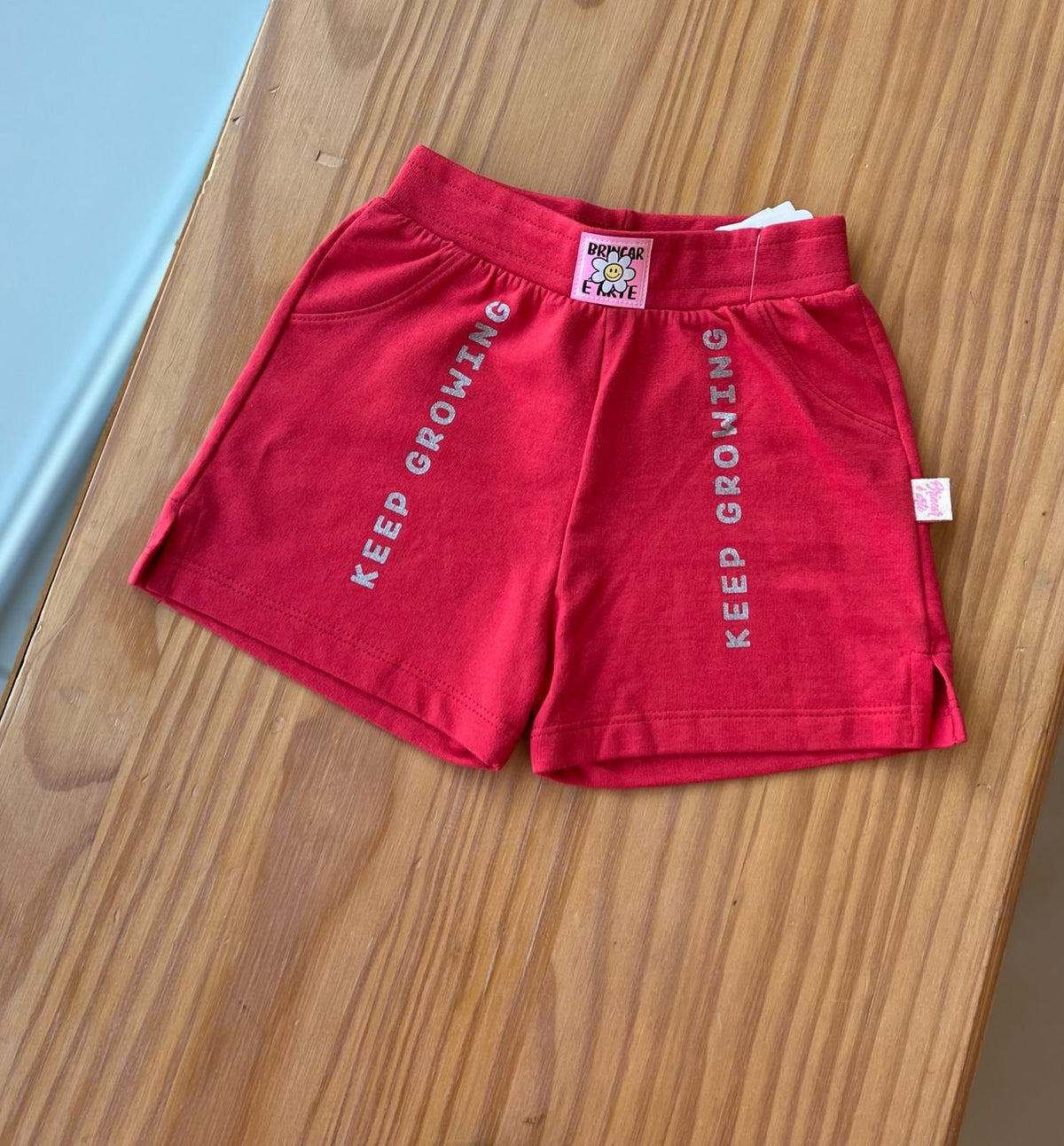 SHORT EM MOLETINHO KEEP GROWING FLOR MENINA BRINCAR - VERMELHO