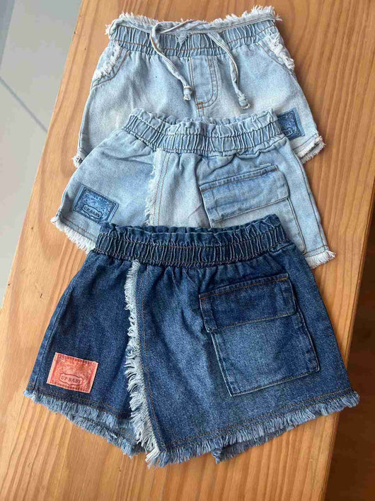 SHORT SAIA JEANS COM BOLSO E BARRA DESFIADA MENINA UP BABY
