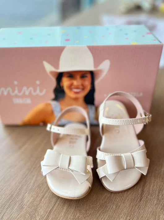 SANDÁLIA COM FECHO LATERAL METÁLICO E LAÇO MENINA SUA CIA